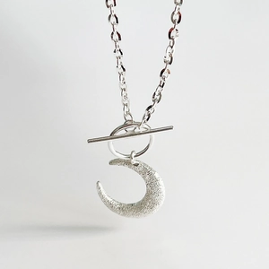 Elegant 925 sterling silver crescent moon necklace with frosted finish and OT clasp