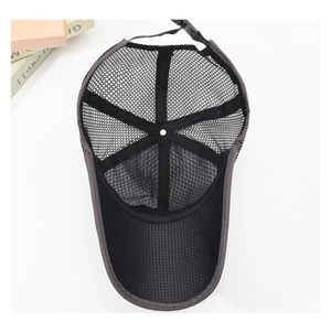 Close-up of the breathable full mesh fabric and adjustable plastic buckle of this sun cap