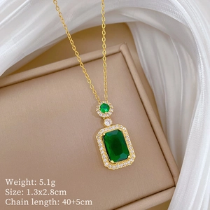 Detail of emerald green rectangular pendant with dimensions 1.3x2.8cm and 45cm gold chain