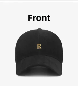 Front view of black baseball cap with premium texture and gold metal R logo detail