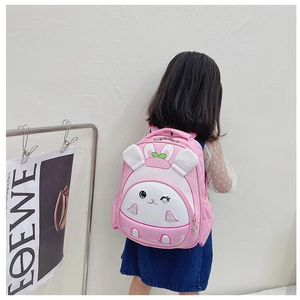 Pink cartoon rabbit backpack for toddlers featuring 3D bunny ears and nylon fabric