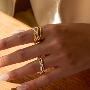 Classic 18K gold stainless steel layered snake ring with shell inlay on female model