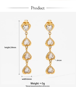 Macro shot showing dimensions of 316 stainless steel heart drop earrings with zircon stones