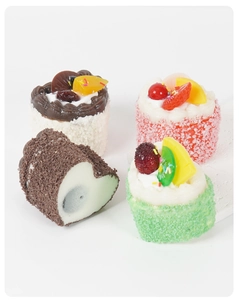 Macro view of realistic heart mousse cake and fruit cream dessert fridge magnets