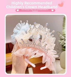 Detail of girls princess headband with lace frills, rhinestone crown and pearl tassels
