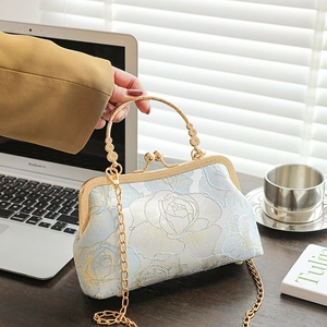 Elegant floral brocade cheongsam handbag with gold frame, top handle and chain strap