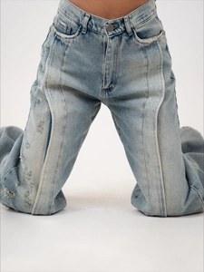 Hellblaue Distressed-Schlagjeans für Damen mit Rissen und hoher Taille im Vintage-Look
