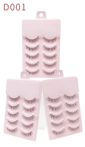 Three packs of natural false eyelashes D001 with five pairs each on pink cardboards