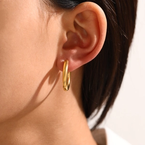 Classic polished gold hoop earrings for women in a minimalist stainless steel style