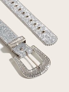 Detailed close-up of sparkling silver rhinestone belt with polished alloy buckle finish