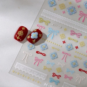 Embossed bow and floral nail stickers on red manicure tips with M-910 retro lace patterns