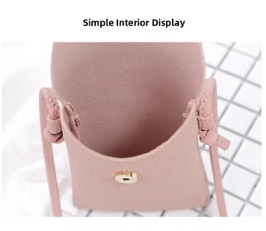 Pink lychee texture crossbody phone bag interior view with magnetic metal snap closure