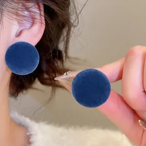 Dark blue flocked button clip-on earrings with invisible resin back for non-pierced ears