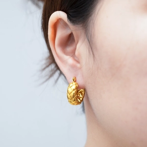 Chic 18K gold plated stainless steel geometric hoop earrings with quilted pattern on ear