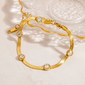 Elegant 18K gold plated stainless steel herringbone chain bracelet with five zircon stones