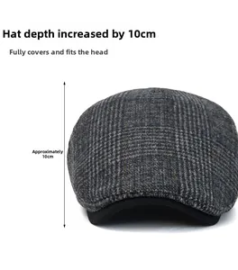 Detail of grey plaid newsboy cap showing the 10cm deep design for a secure and stable fit