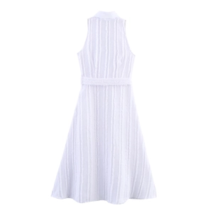 Elegant white sleeveless maxi dress with fringe texture and waist belt detail