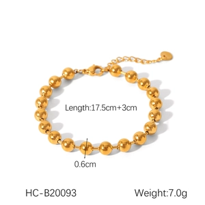 Detail eines goldenen Edelstahl-Perlenarmbands mit Maßangaben 17,5cm und 0,6cm Perlen