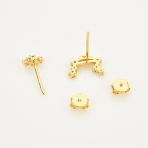 Detailed macro view of S925 sterling silver hallmarked studs with gold finish