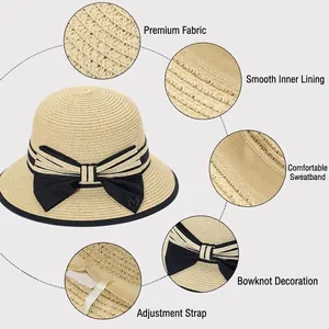 Women's foldable straw sun hat with black ribbon bow and adjustable inner band
