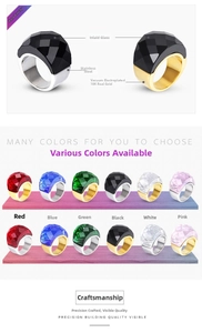 Detailed view of faceted glass rings in six colors with 18k gold and silver plated bands