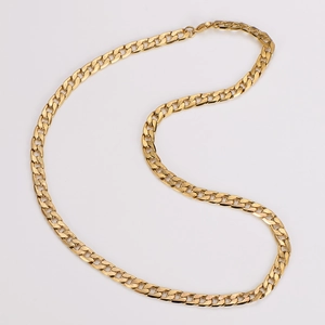 Detail of 7mm golden stainless steel NK curb chain with brushed matte finish texture