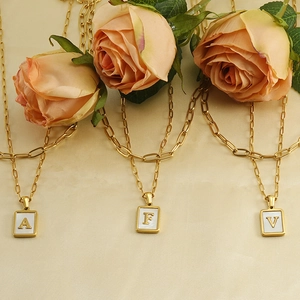18K gold plated paperclip chain necklace with square initial pendants A, F, and V