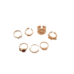 Set of 7 vintage gold textured open rings with resin stones and irregular geometric designs