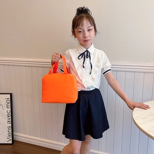 Simple orange insulated lunch tote bag with top zipper handles for kids and school girls