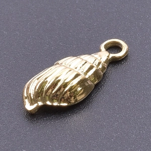 Close-up of golden conch shell pendant with polished metallic finish for DIY jewelry