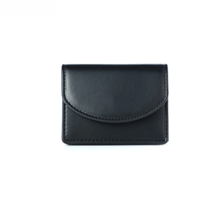 Close-up of a black leather card wallet with a curved flap and precise stitching details