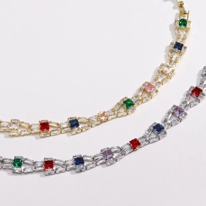 Close-up of dual-layer tennis bracelet with colorful square cubic zirconia and metal plating