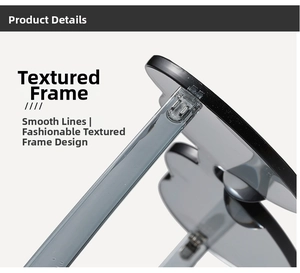 Close-up of metal hinge and translucent dark grey frame on rimless heart sunglasses