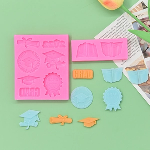 Graduation silicon fondant mold featuring cap, scroll, and 2023 text for baking