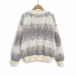 Loose knit gray and white fuzzy cardigan sweater with snowflake texture and ribbed trim