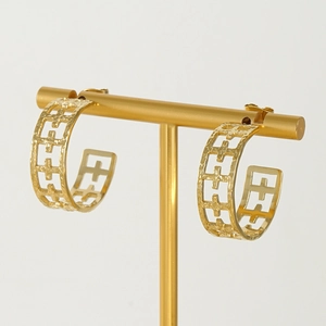 Classic gold titanium steel C-shaped hoop earrings with geometric hollow design