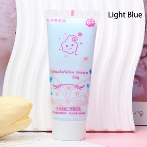 Close-up of 50g light blue simulation cream glue tube with SGS certification for DIY crafts