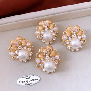 Vintage gold pearl flower earrings with sparkling rhinestones and elegant French style
