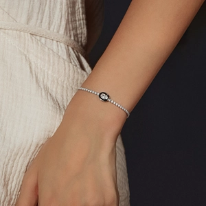 Elegant S925 sterling silver tennis bracelet with black enamel and sparkling zirconia