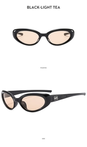 Close-up of black Y2K sports sunglasses with tea lenses and metal logo on temples
