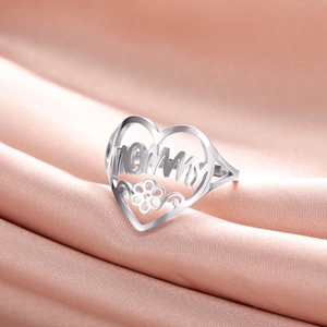 Silver stainless steel heart open ring with MOMMY lettering on pink silk background