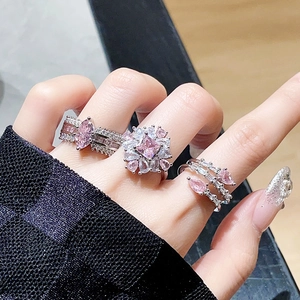 Three-piece silver ring set with pink pear-shaped zircon stones for a luxury women's look