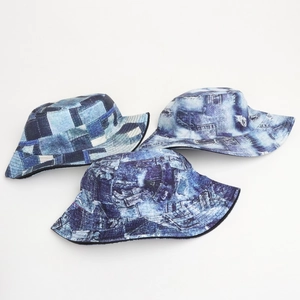 Detailed view of three vintage 80s 90s denim style bucket hats with patchwork design