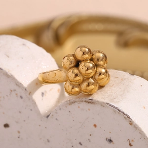 Macro detail of 18K gold plated stainless steel ring with unique bubble cluster design