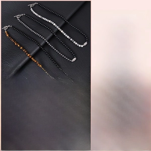 Collier en perles naturelles 6mm oeil de tigre et obsidienne avec fermoir OT