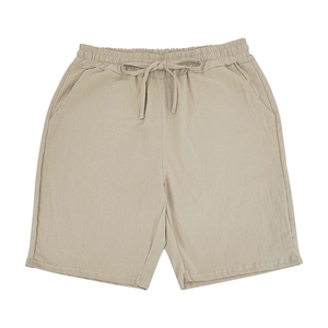 Detail of khaki linen shorts with elastic drawstring waist and side pockets