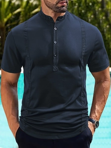 Detail of navy blue short sleeve Henley polo shirt with textured vertical stripes