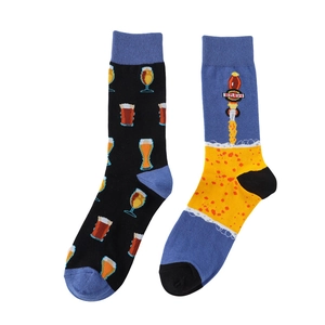 Detail view of cotton socks with asymmetric beer brew glass and machine patterns