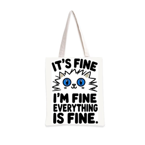 Détail du sac cabas en toile avec chat de dessin animé et texte humoristique