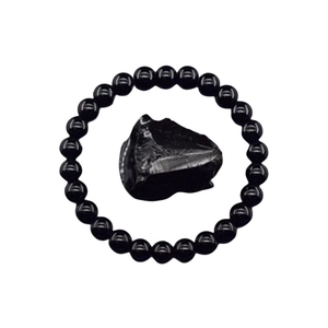 Handmade black obsidian beaded bracelet featuring a natural raw stone center bead